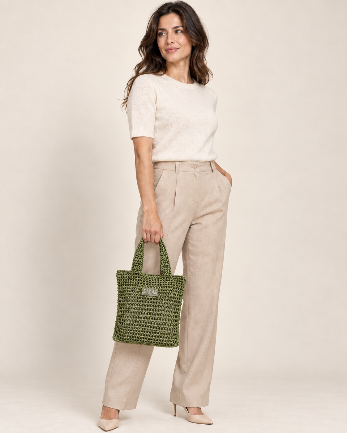 Anteprima IA: modella di riferimento con la borsa Aubrey